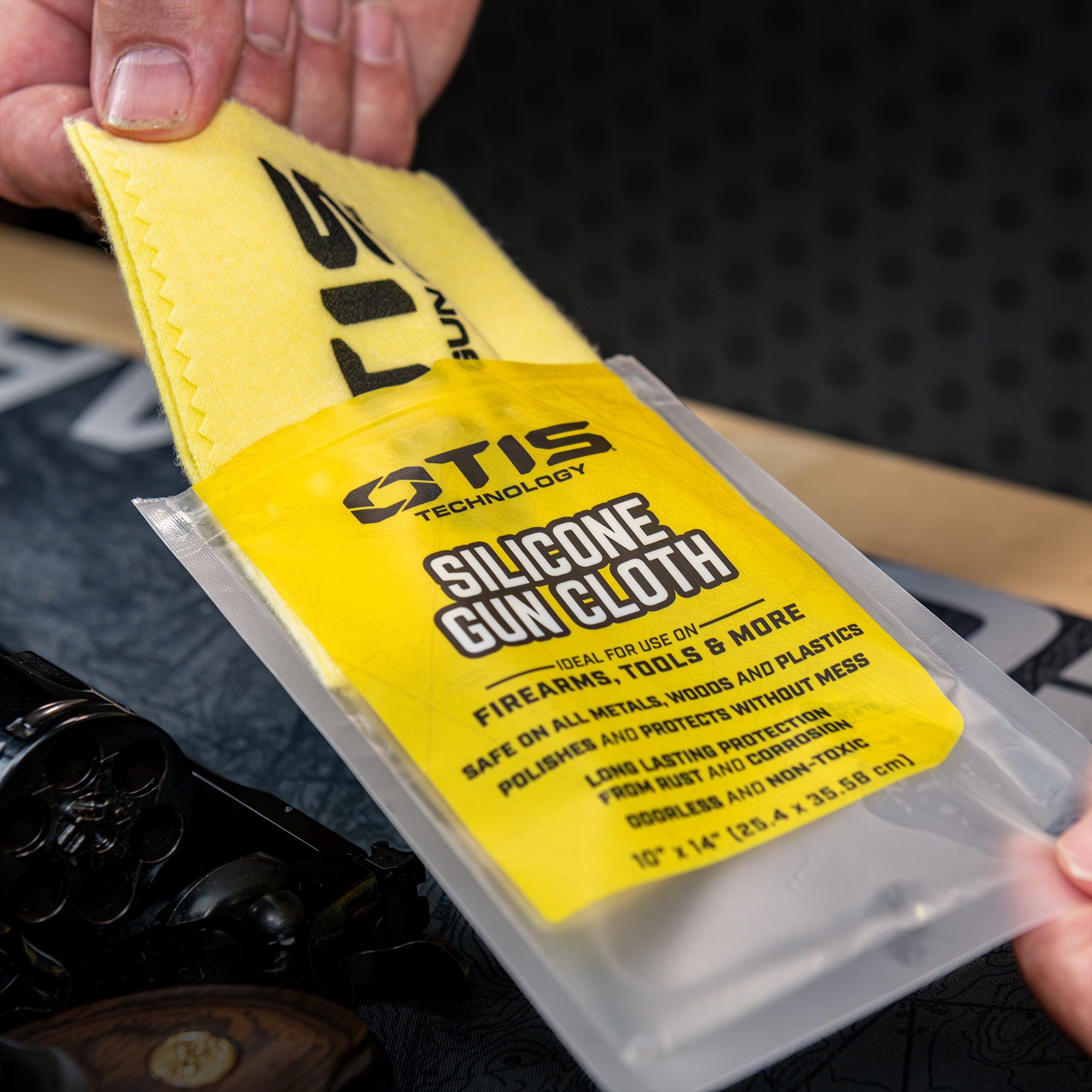 Otis Technology Silicone Gun Cloth being removed from resealable bag