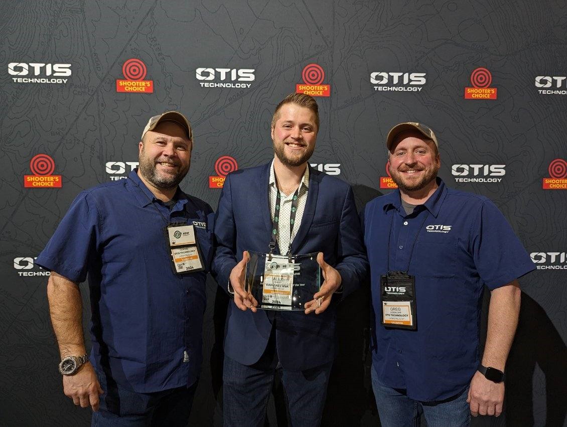 Alex Pinos from Rampart receiving International Distributor of the Year Award from Brad McIntyre (left) and Greg Essenlohr (right) from Otis Technology